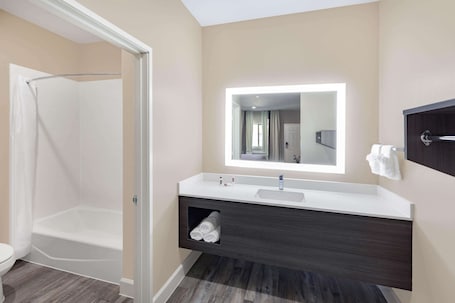 Combined shower/bathtub, free toiletries, towels. Super 8 by Wyndham Houston NW Beltway 8/West Rd
