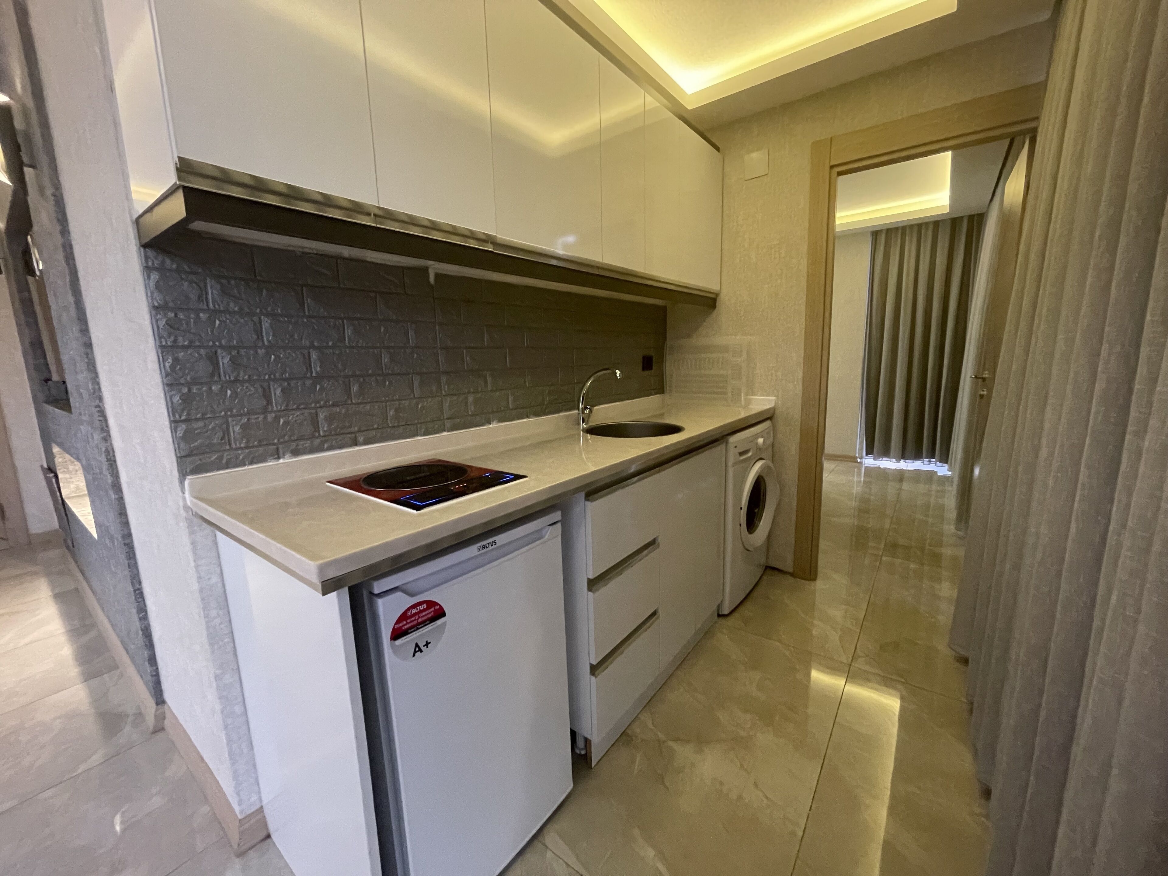deluxe apartment, 2 bedrooms | private kitchen | mini-fridge, microwave, stovetop, coffee/tea maker