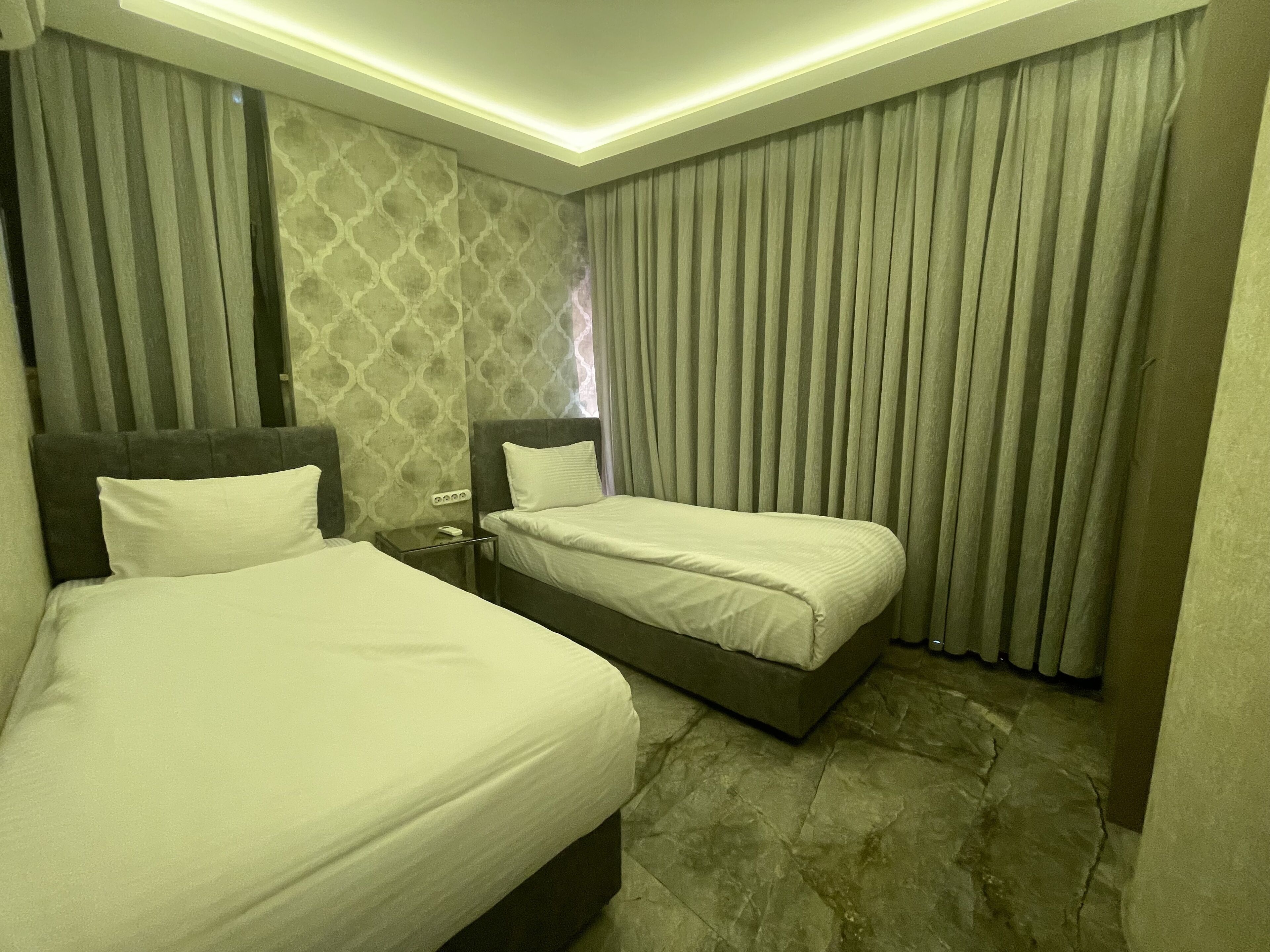 economy double or twin room | 3 bedrooms, minibar, in-room safe, blackout curtains