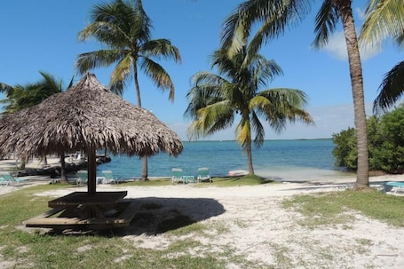 Private beach, beach towels, kayaking. Rock Reef Resort
