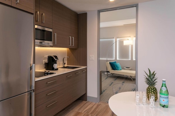 Fridge, microwave, stovetop, coffee/tea maker