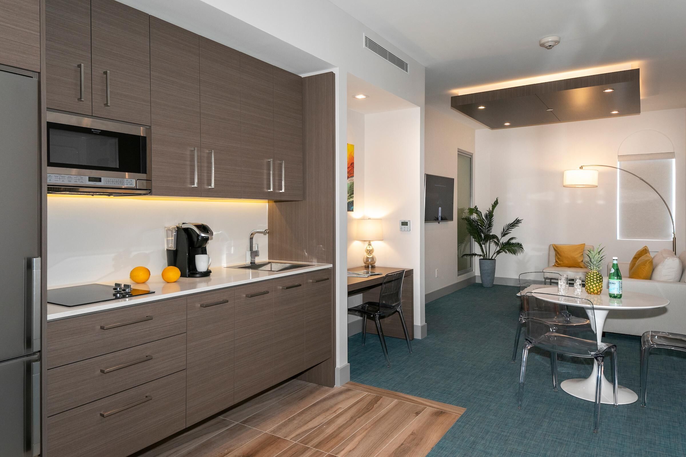 Fridge, microwave, stovetop, coffee/tea maker