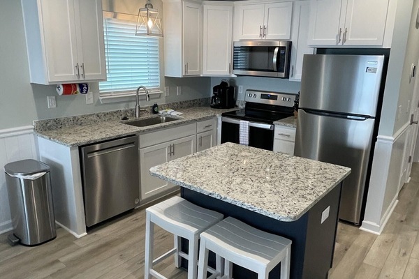 Refrigerador, microondas, horno y parrilla de estufa