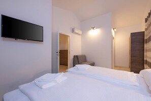 3 多间卧室、客房内保险箱、熨斗/熨衣板、免费 WiFi