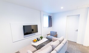 Huoneisto, 1 makuuhuone, tupakointi kielletty (Type A) | Olohuone | Taulutelevisio