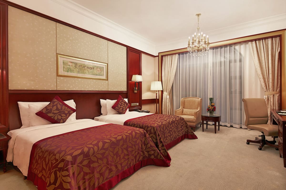 Garden View Twin Room | 1 bedroom, minibar, in-room safe, blackout drapes
