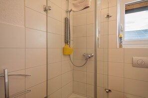 Bathtub, hair dryer, towels