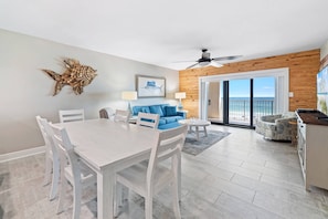 Enjoy meals in the dining area with a view of the ocean.