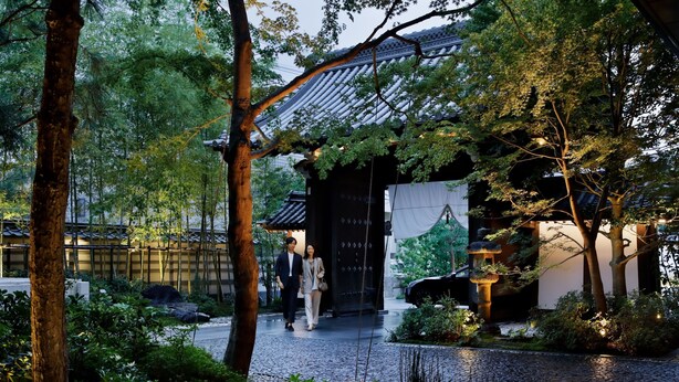 A traditional Japanese-style building with a tiled roof, surrounded by lush greenery and a cobblestone pathway. - HOTEL THE MITSUI KYOTO, a Luxury Collection Hotel & Spa (Kyoto)