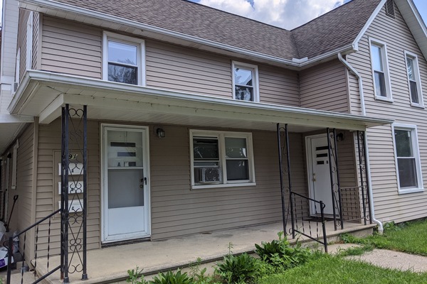 Apartment A is on the right and a side door by the patio not shown