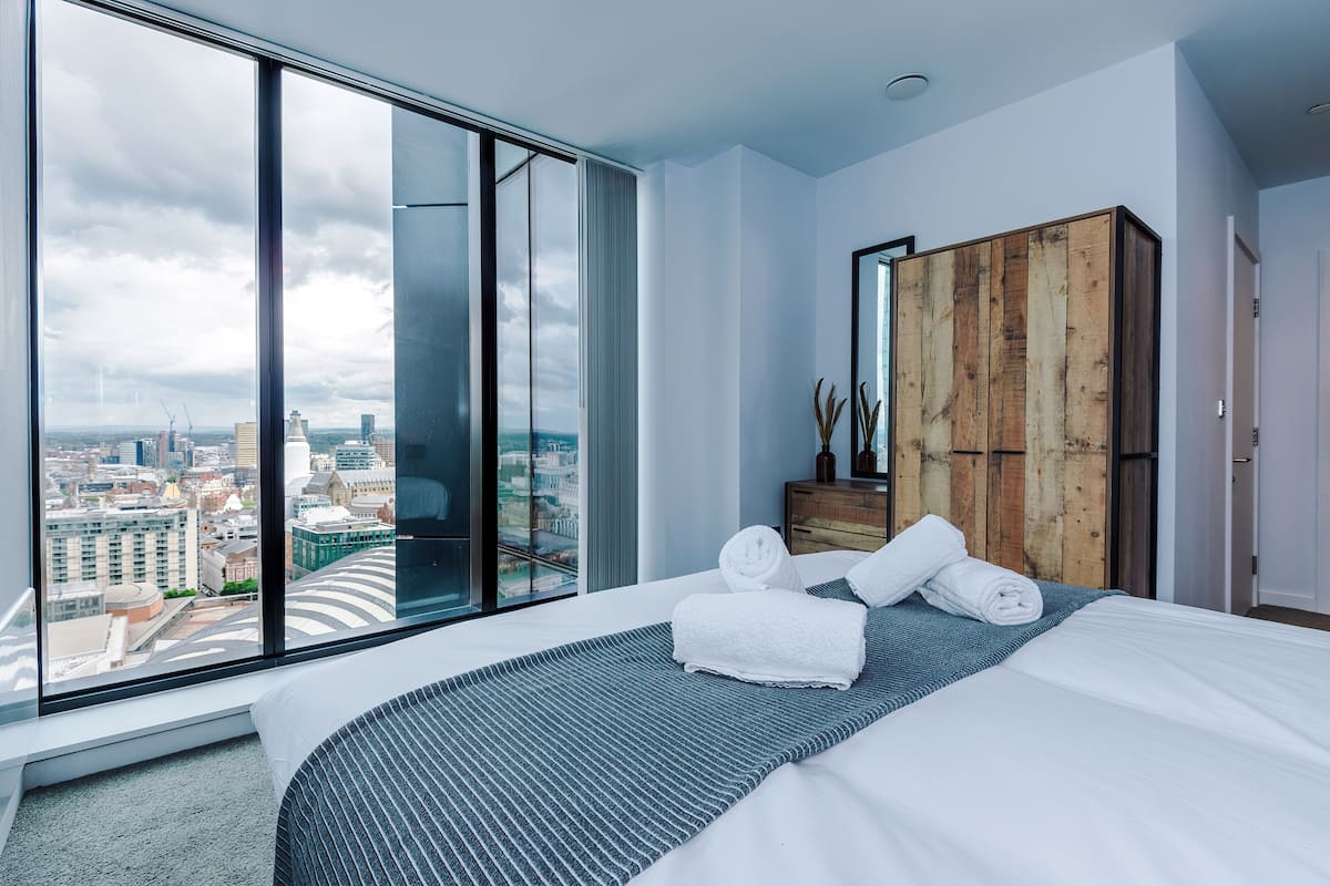 2 bedrooms, premium bedding, laptop workspace, soundproofing