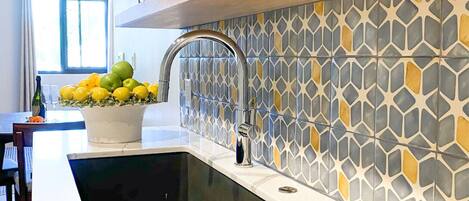 Microwave, coffee/tea maker, cookware/dishes/utensils