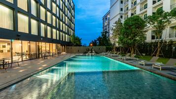 Seasonal outdoor pool, pool umbrellas