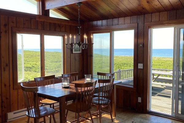 DR opening to expansive deck and ocean. New glasses, plates, flatware, etc.