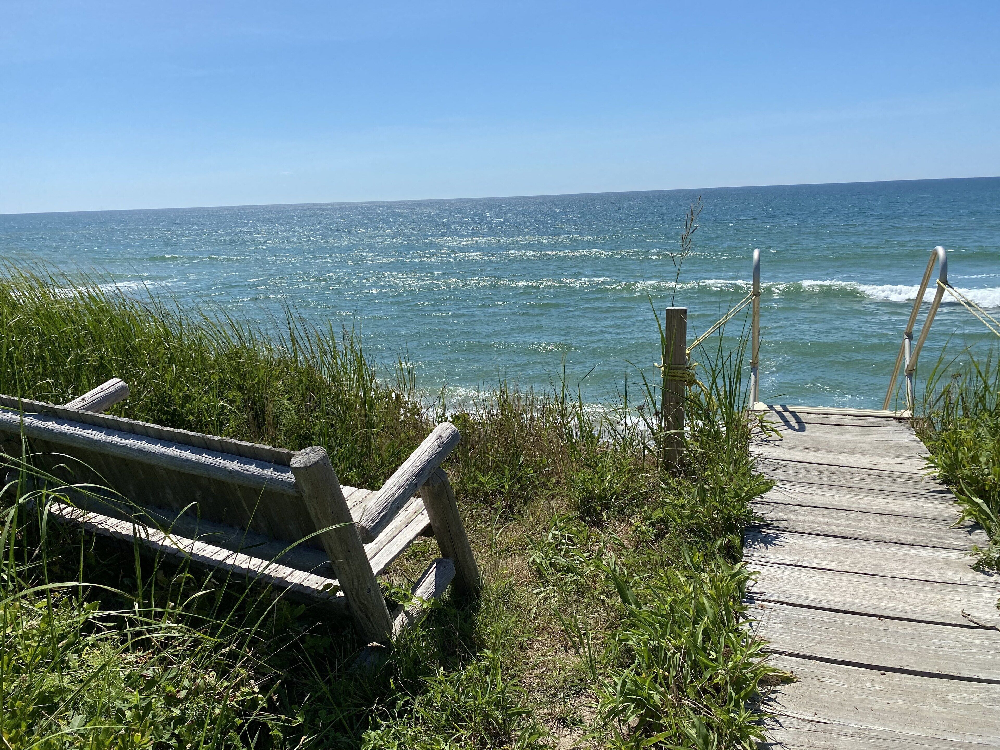 Our private steps to the beach - 200 feet from our house - with bench for views