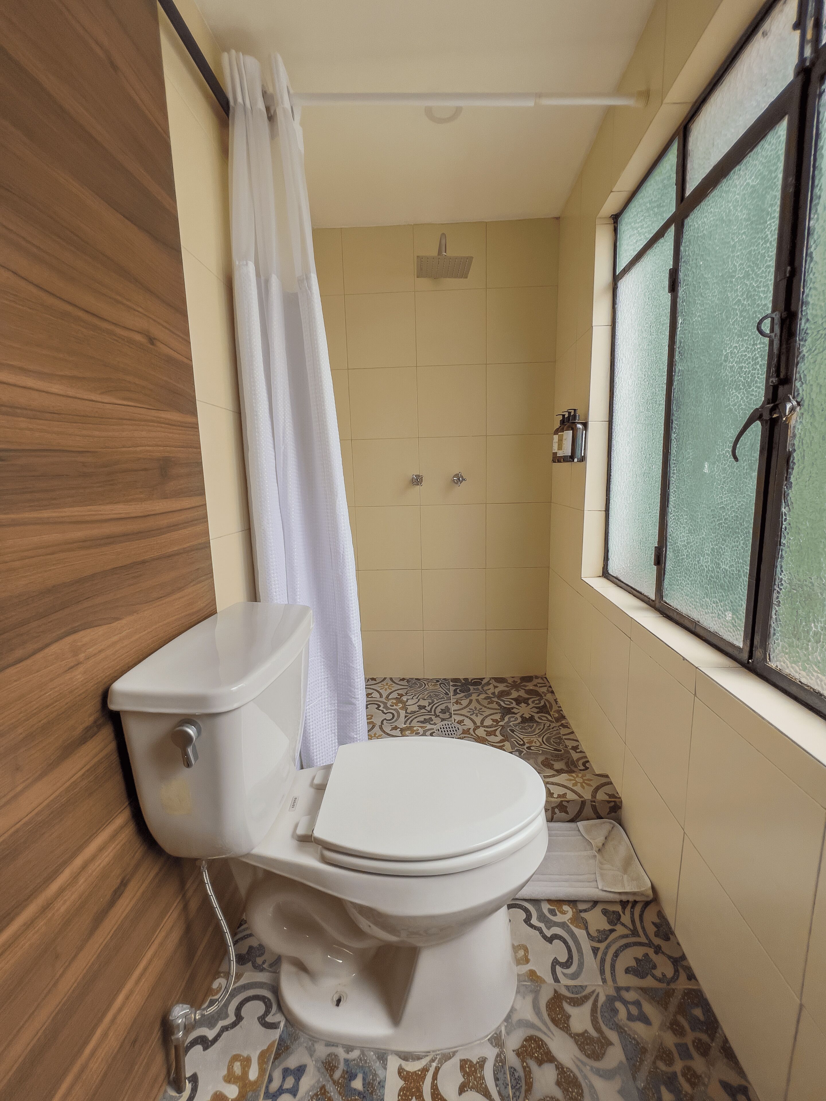 basic room, 1 queen bed | bathroom | designer toiletries, hair dryer, bathrobes, slippers