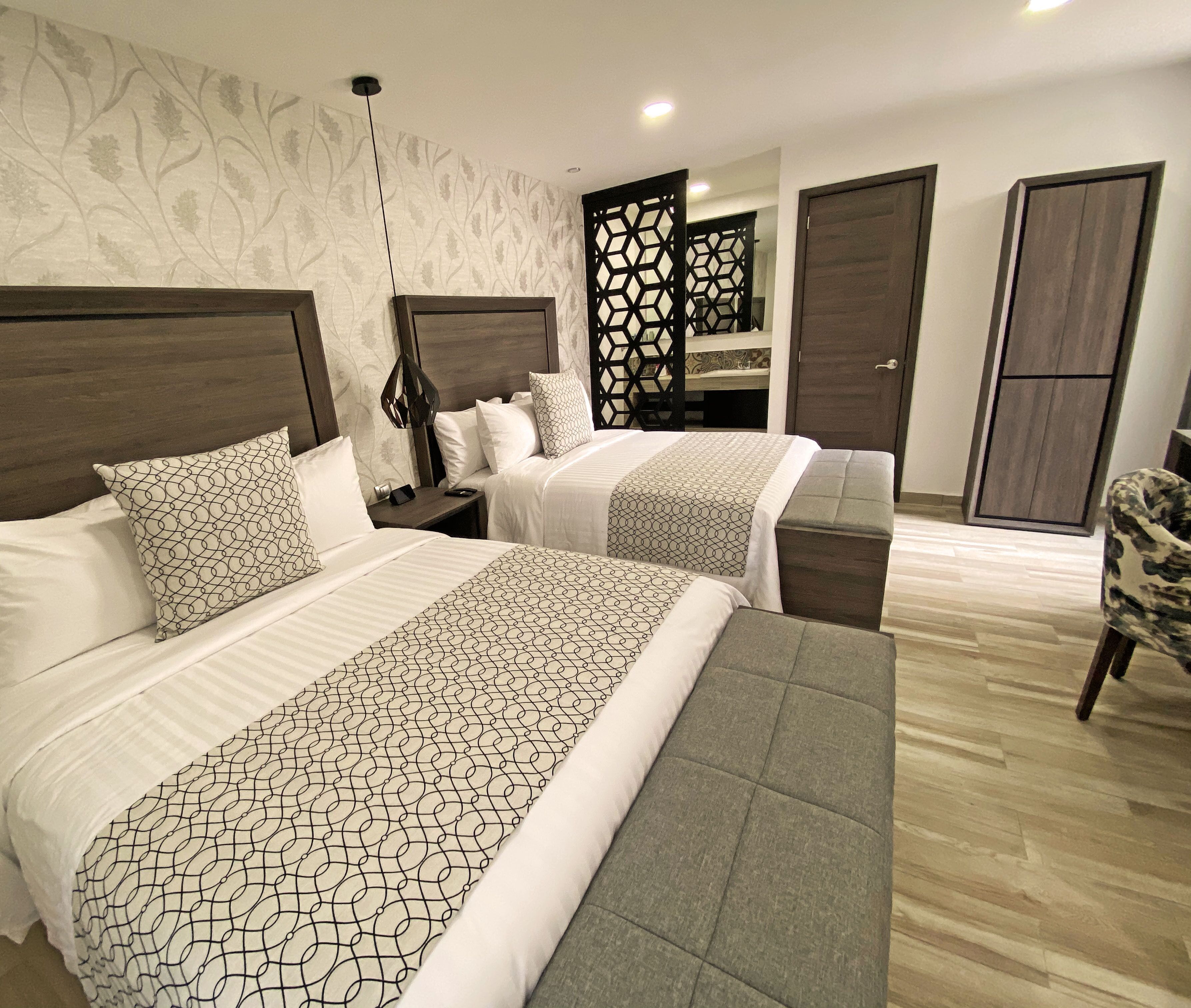 Premium bedding, down comforters, in-room safe, laptop workspace
