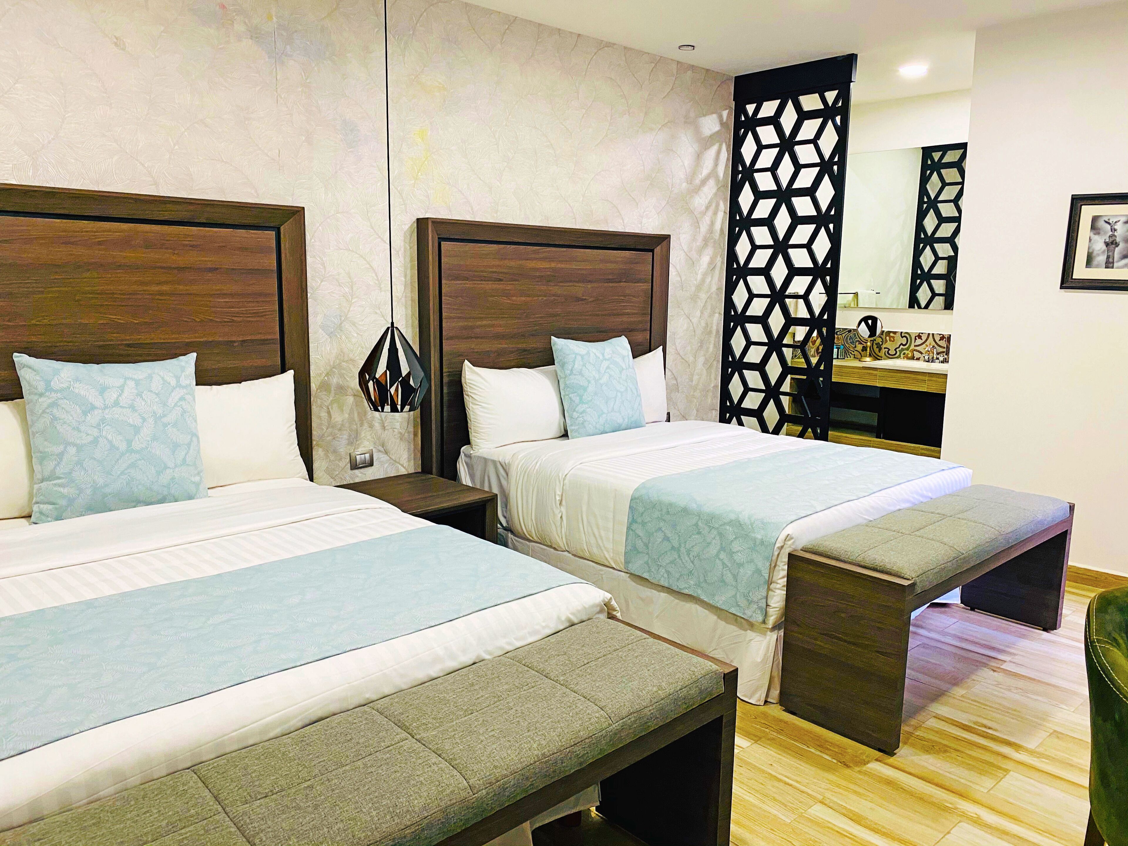 Premium bedding, down comforters, in-room safe, laptop workspace