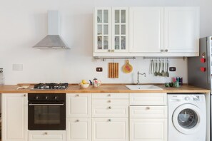 Ovn, kokeplater og brødrister