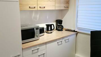 Fridge, microwave, oven, highchair