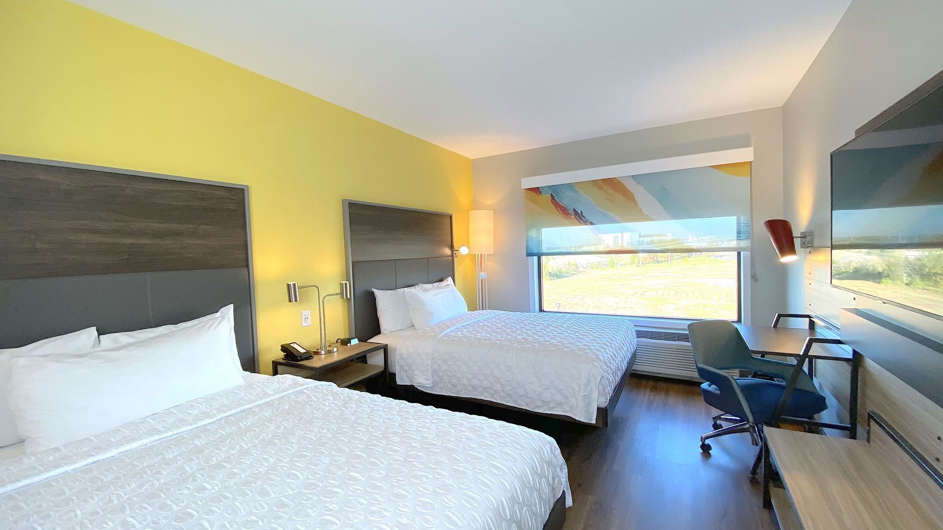 Individually furnished, desk, laptop workspace, blackout drapes