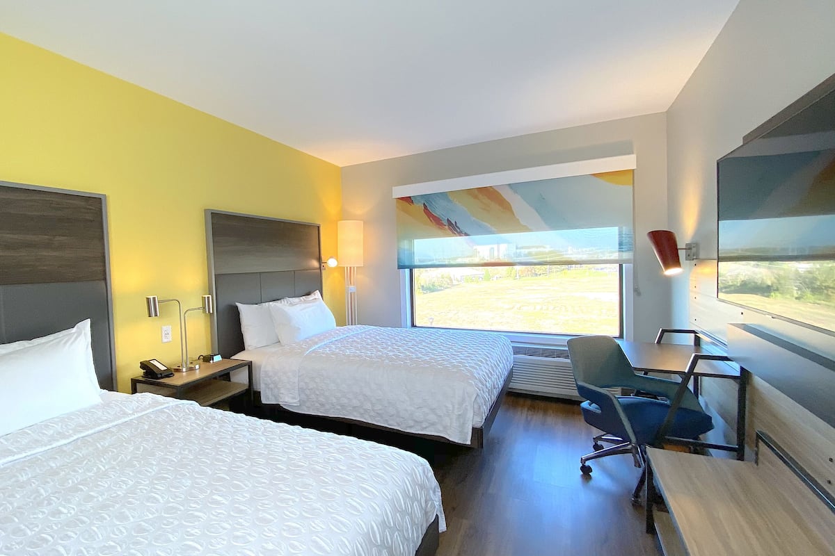 Individually furnished, desk, laptop workspace, blackout drapes