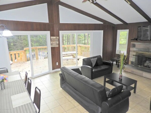 LCD TV, fireplace, table football