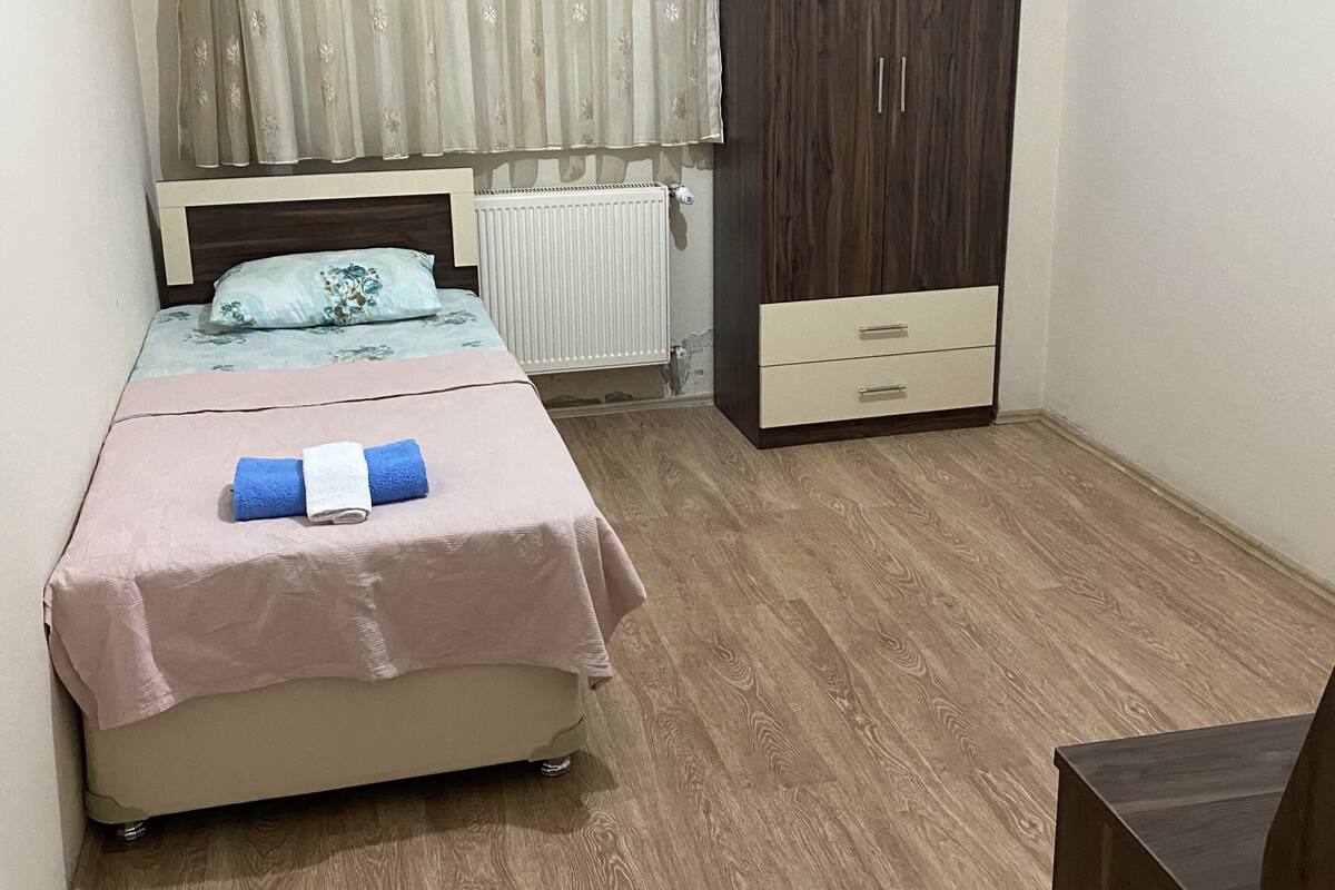 Apartment, 3 Bedrooms | 4 bedrooms, desk, laptop workspace, iron/ironing board