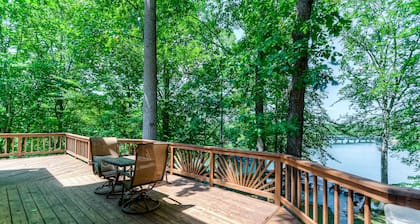 Spacious lake lodge with a private dock, wraparound decks & foosball