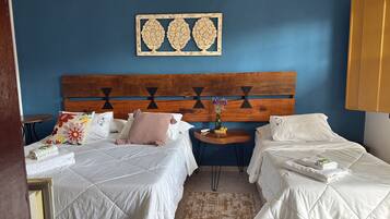 Quarto Triplo Família | Roupas de cama antialérgicas, frigobar, Wi-Fi de cortesia, roupa de cama