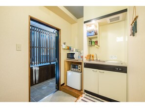 Fridge, microwave, stovetop, cookware/dishes/utensils