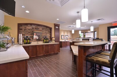 King Suite in Tomball | Shared Outdoor Pool + 24h Fitness Center