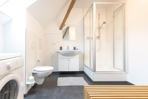 Shower, towels, toilet paper