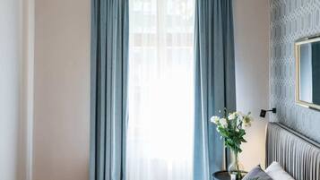 Premium Suite | 2 bedrooms, individually furnished, iron/ironing board, free WiFi