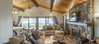 LARGE Clean Updated Lake front Cottage with THE MOST INCREDIBLE VIEW & BEACH !!!