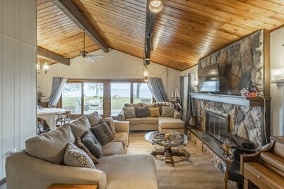 LARGE Clean Updated Lake front Cottage with THE MOST INCREDIBLE VIEW & BEACH !!!