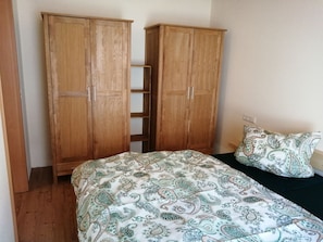 2 bedrooms, travel crib, WiFi, bed sheets