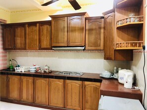 Fridge, electric kettle, cookware/dishes/utensils