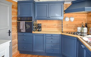 Fridge, stovetop, dishwasher, coffee/tea maker