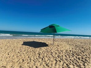 On the beach, beach towels