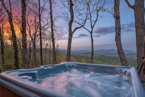 A hot tub in a forest with a view of mountains. - September Special | Hot Tub+Breathtaking Mtn Views (Spruce Pine)