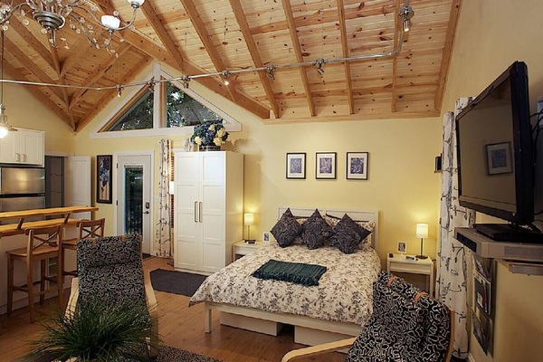 High cathedral ceilings provide measure of spaciousness in the living and sleeping areas