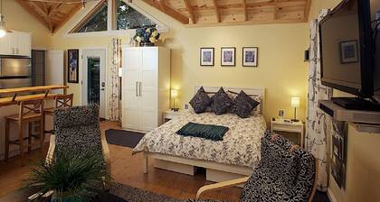 Tradhuset: Swedish "IKEA" Treehouse w/Shaded Deck