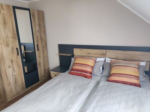 2 slaapkamers, een strijkplank/strijkijzer, gratis wifi