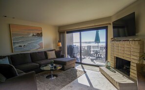 Flat-screen TV, fireplace, DVD player