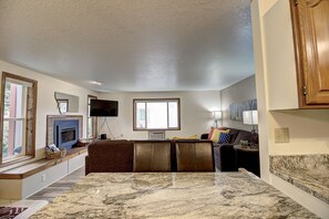 Smart TV, fireplace, books