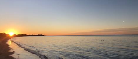 On the beach, sun loungers