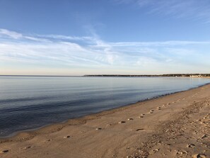 On the beach, sun-loungers