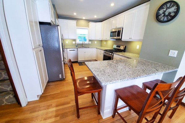 Welcome to your well-stocked gourmet kitchen with granite countertops!