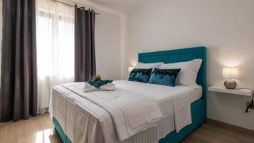 3 quartos, cofres nos quartos, Wi-Fi de cortesia, roupa de cama